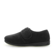 Black microsuede slip-on slippers, side view with padded strap and low rubber sole.