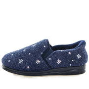 Women’s navy slip-on slippers, side view, with white flower pattern and black sole