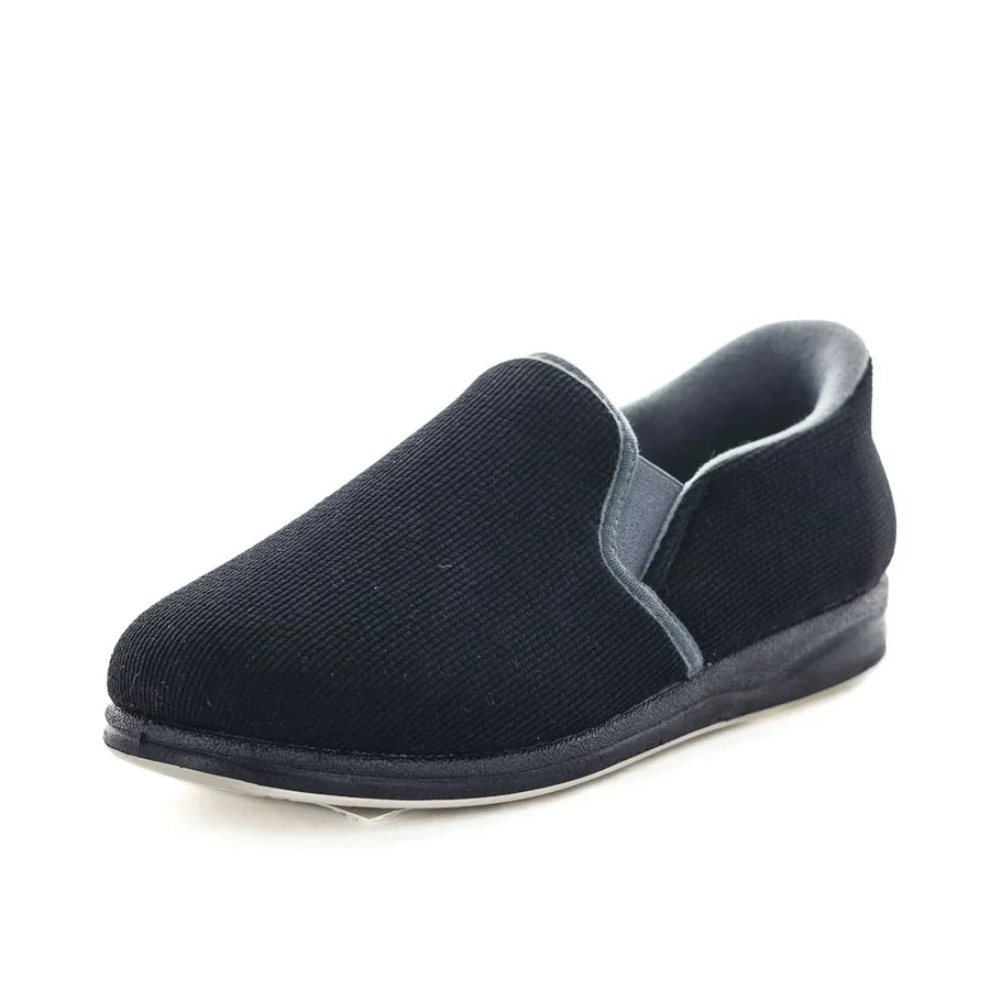 Black slip-on slipper with grey collar trim and textured fabric upper, side view.