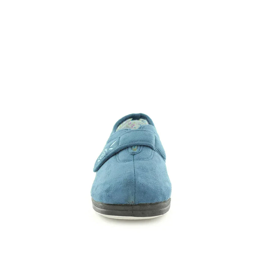 Women’s blue denim slippers, heel view with back strap and dark sole
